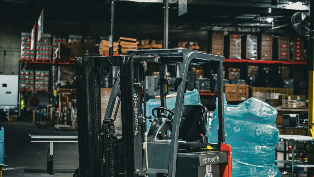 Forklift parked inside a warehouse
