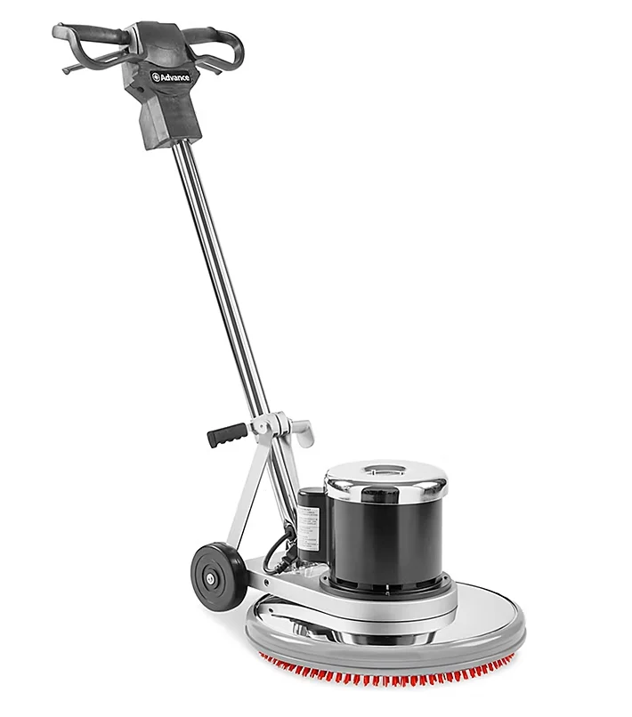 Single-disc floor machine used on stubborn warehouse floor areas